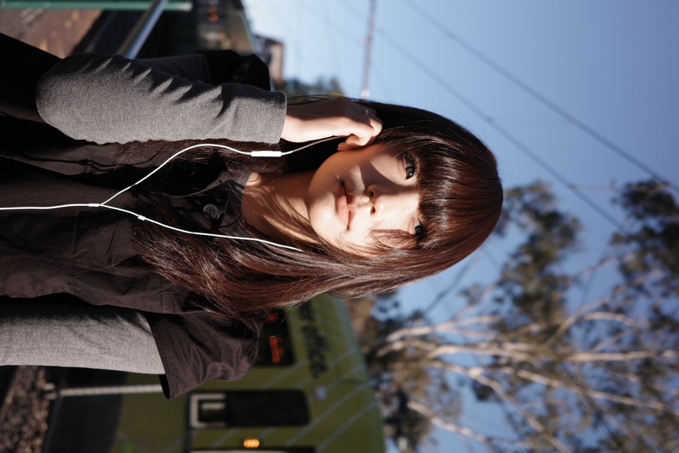 Quiet portrait beside a Melbourne tram